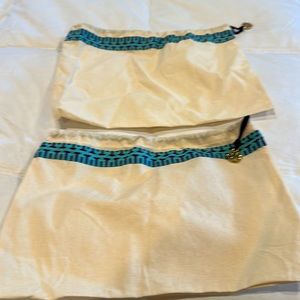 Tory Burch small drawstring. Dust cover. Cream color. blue drawstring &Tory logo